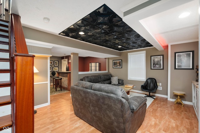6026 Pennyworth Cir, Indianapolis, IN 46203 - living room with light wood-type flooring, baseboards, and stairway