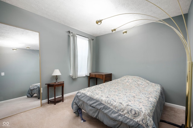 6026 Pennyworth Cir, Indianapolis, IN 46203 - bedroom with carpet, a textured ceiling, and baseboards