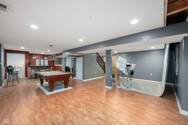 6026 Pennyworth Cir, Indianapolis, IN 46203 - rec room featuring light wood-style floors, baseboards, billiards, recessed lighting, and bar