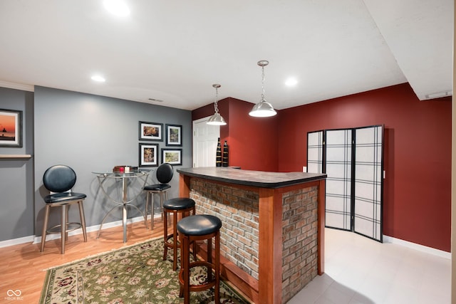 6026 Pennyworth Cir, Indianapolis, IN 46203 - indoor dry bar featuring baseboards, recessed lighting, and pendant lighting