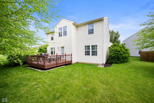 6026 Pennyworth Cir, Indianapolis, IN 46203 - rear view of property with a wooden deck and a lawn