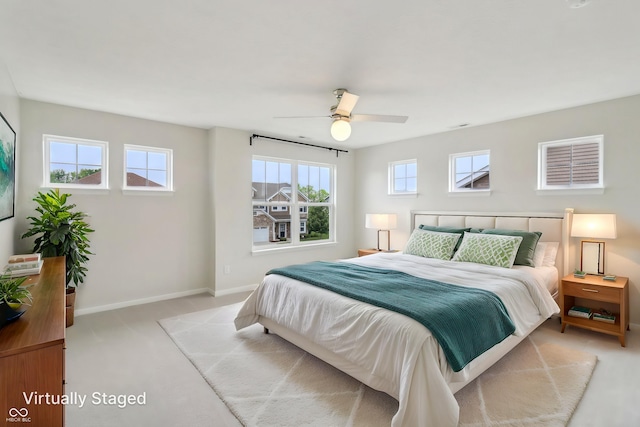 951 Parker Ln, Westfield, IN 46074 - bedroom with light carpet, baseboards, and a ceiling fan