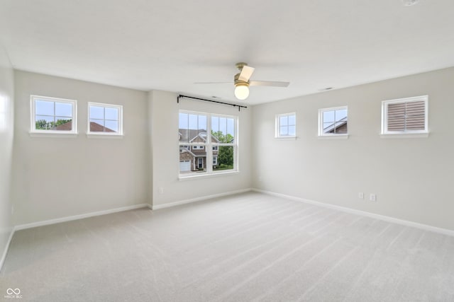951 Parker Ln, Westfield, IN 46074 - spare room featuring baseboards, ceiling fan, and light colored carpet