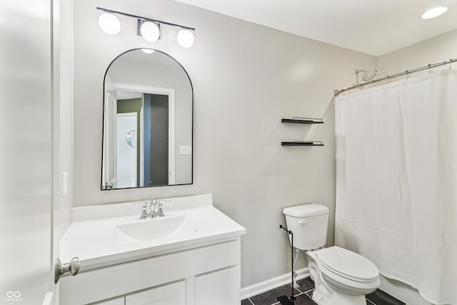 951 Parker Ln, Westfield, IN 46074 - bathroom featuring vanity, toilet, baseboards, and a shower with shower curtain