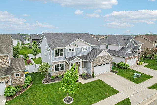 951 Parker Ln, Westfield, IN 46074 - craftsman inspired home featuring stone siding, a residential view, and concrete driveway