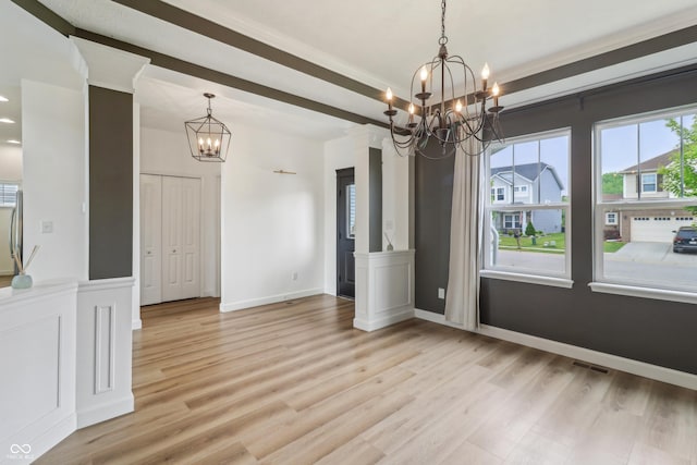 951 Parker Ln, Westfield, IN 46074 - unfurnished dining area featuring a chandelier, light wood-style floors, and baseboards