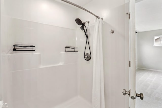 951 Parker Ln, Westfield, IN 46074 - bathroom featuring curtained shower and baseboards