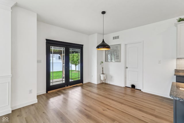 951 Parker Ln, Westfield, IN 46074 - unfurnished dining area with light wood-type flooring and baseboards