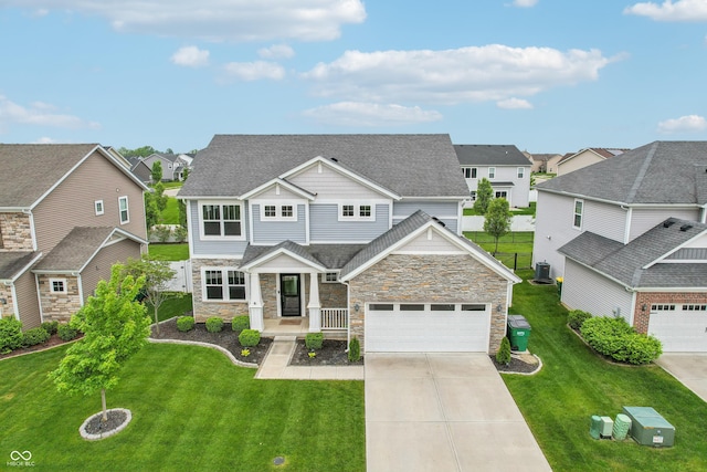951 Parker Ln, Westfield, IN 46074 - craftsman house with a residential view, stone siding, concrete driveway, and central air condition unit