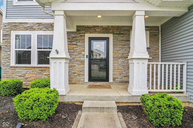 951 Parker Ln, Westfield, IN 46074 - doorway to property featuring stone siding and a porch
