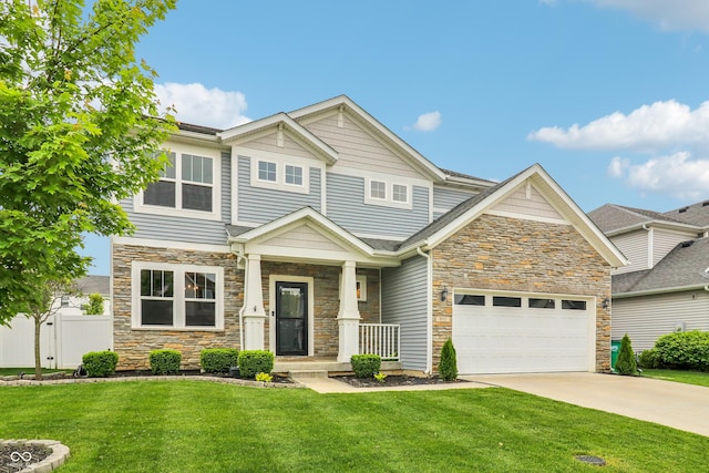 951 Parker Ln, Westfield, IN 46074 - craftsman inspired home featuring stone siding, driveway, and a garage
