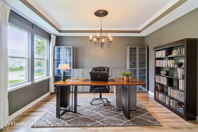 951 Parker Ln, Westfield, IN 46074 - office space featuring wood finished floors, a chandelier, ornamental molding, a raised ceiling, and baseboards