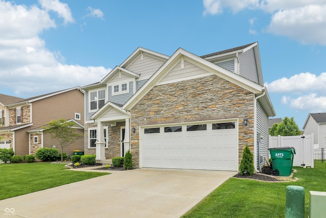 951 Parker Ln, Westfield, IN 46074 - view of front facade featuring stone siding, concrete driveway, and an attached garage