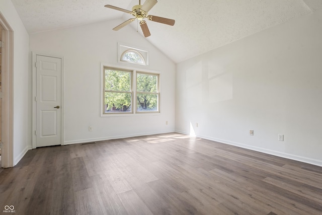 9572 Maple Way, Indianapolis, IN 46268 - unfurnished room featuring a ceiling fan, high vaulted ceiling, a textured ceiling, dark wood-style flooring, and baseboards