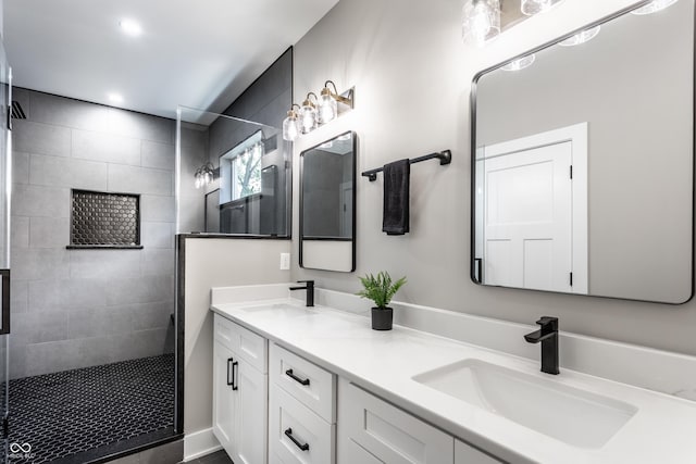 43 N Walcott St, Indianapolis, IN 46201 - bathroom with a walk in shower and double vanity