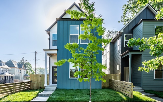 43 N Walcott St, Indianapolis, IN 46201 - contemporary house featuring board and batten siding and entry steps