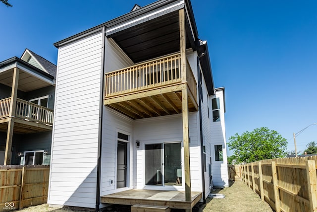43 N Walcott St, Indianapolis, IN 46201 - back of house with a balcony and a fenced backyard