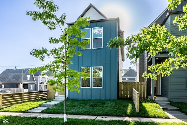 43 N Walcott St, Indianapolis, IN 46201 - view of front of property with board and batten siding