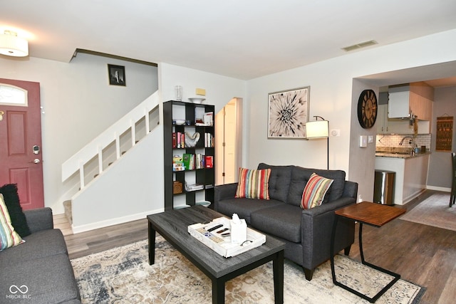 1236 Central Ave, Indianapolis, IN 46202 - living area featuring stairway and wood finished floors