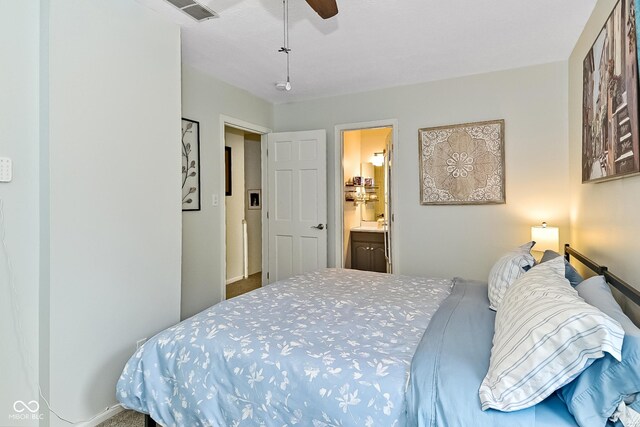 1236 Central Ave, Indianapolis, IN 46202 - bedroom featuring ensuite bath and a ceiling fan