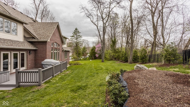 view of yard with a deck