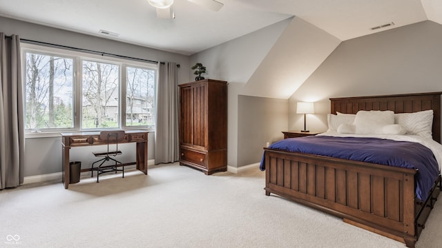 bedroom featuring light carpet, baseboards, lofted ceiling, and ceiling fan