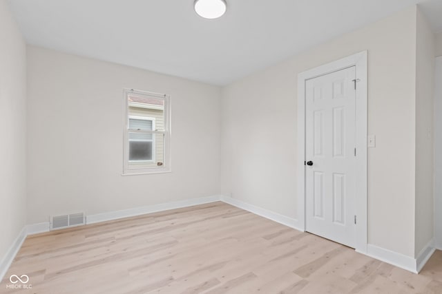 1108 N Ritter Ave, Indianapolis, IN 46219 - unfurnished room featuring light wood-type flooring and baseboards