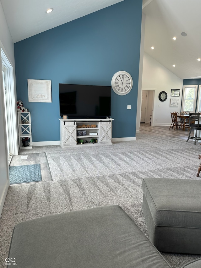 951 N Maiellen Dr, Greenfield, IN 46140 - living room featuring carpet flooring, baseboards, high vaulted ceiling, and recessed lighting