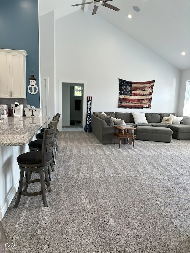 951 N Maiellen Dr, Greenfield, IN 46140 - living area with high vaulted ceiling, a ceiling fan, light carpet, and recessed lighting