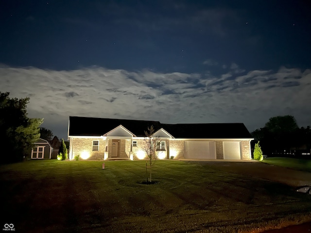 951 N Maiellen Dr, Greenfield, IN 46140 - ranch-style home featuring a shed, a yard, an attached garage, and driveway