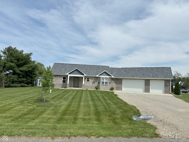 951 N Maiellen Dr, Greenfield, IN 46140 - view of front facade featuring gravel driveway, an attached garage, a front lawn, brick siding, and roof with shingles