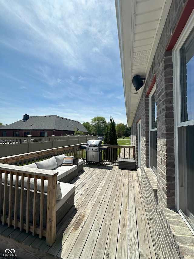 951 N Maiellen Dr, Greenfield, IN 46140 - wooden deck with an outdoor living space, a fenced backyard, and area for grilling