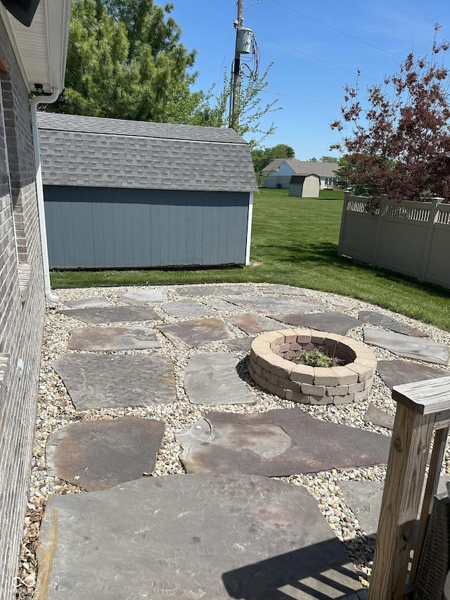951 N Maiellen Dr, Greenfield, IN 46140 - view of patio featuring a fire pit