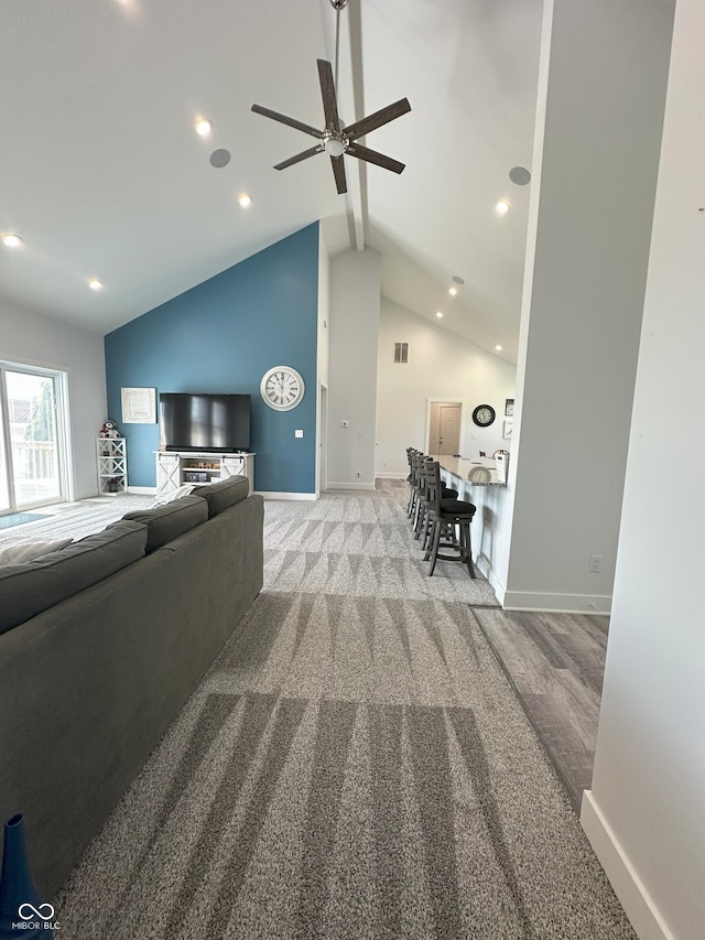 951 N Maiellen Dr, Greenfield, IN 46140 - carpeted living area with vaulted ceiling, a ceiling fan, baseboards, and recessed lighting