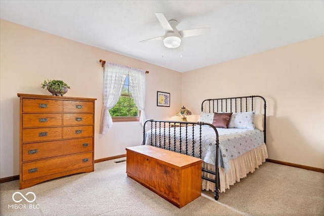 12082 Old Stone Dr, Indianapolis, IN 46236 - bedroom featuring baseboards, light carpet, and ceiling fan