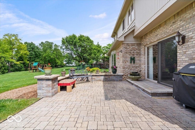 12082 Old Stone Dr, Indianapolis, IN 46236 - view of patio / terrace with a playground