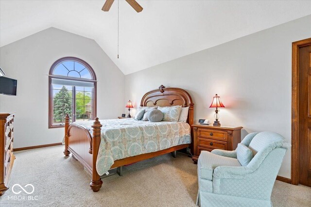12082 Old Stone Dr, Indianapolis, IN 46236 - bedroom featuring light carpet, vaulted ceiling, baseboards, and a ceiling fan