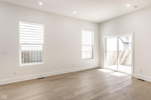 39 N Walcott St, Indianapolis, IN 46201 - empty room with light wood-type flooring, recessed lighting, and baseboards