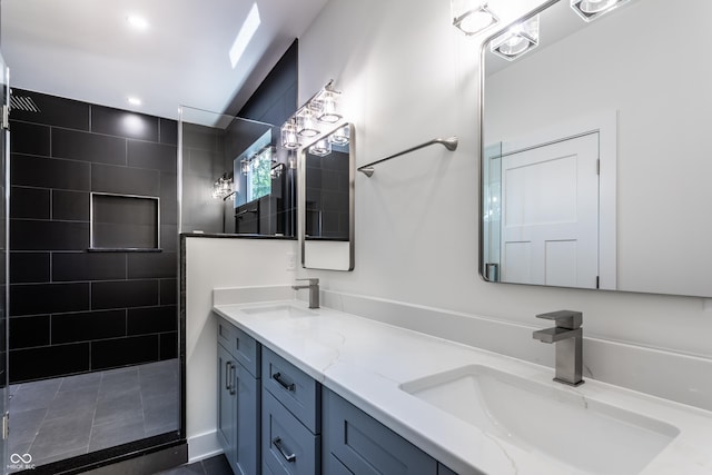 39 N Walcott St, Indianapolis, IN 46201 - bathroom featuring walk in shower and double vanity