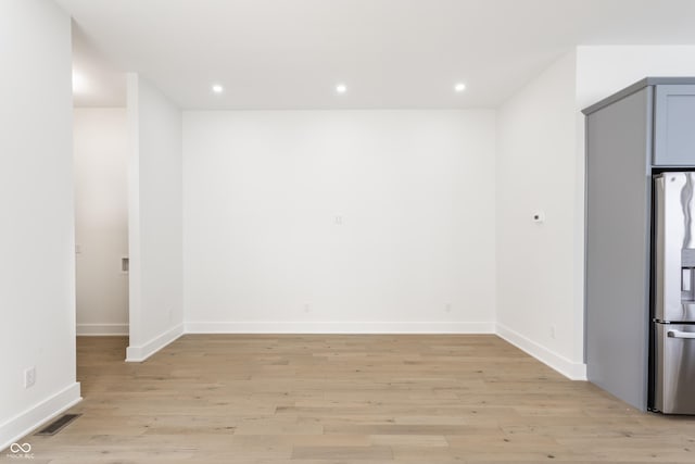 39 N Walcott St, Indianapolis, IN 46201 - empty room featuring light wood finished floors, baseboards, and recessed lighting
