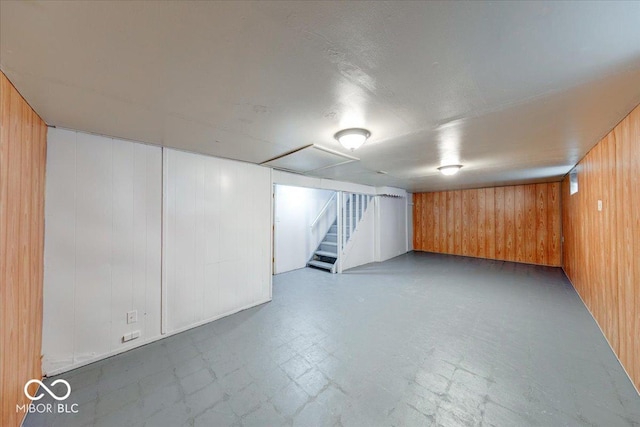 1852 N Warman Ave, Indianapolis, IN 46222 - finished basement with wooden walls, tile patterned floors, and stairway