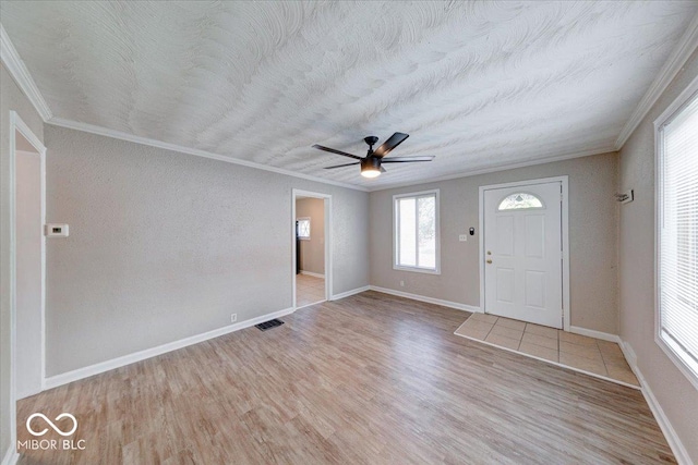 1852 N Warman Ave, Indianapolis, IN 46222 - entrance foyer featuring ornamental molding, wood finished floors, and ceiling fan