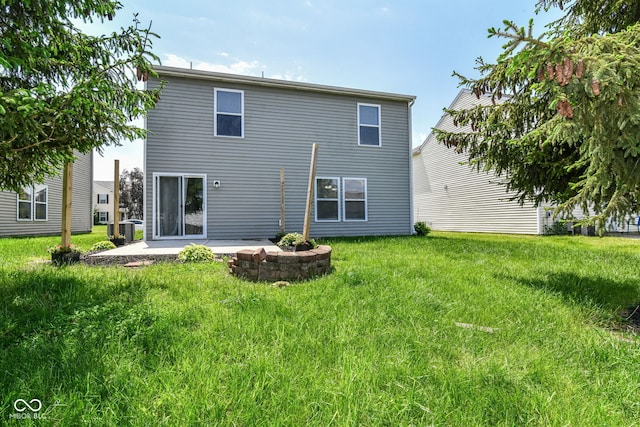 9676 W Constellation Dr, Pendleton, IN 46064 - rear view of house with a patio area and a yard