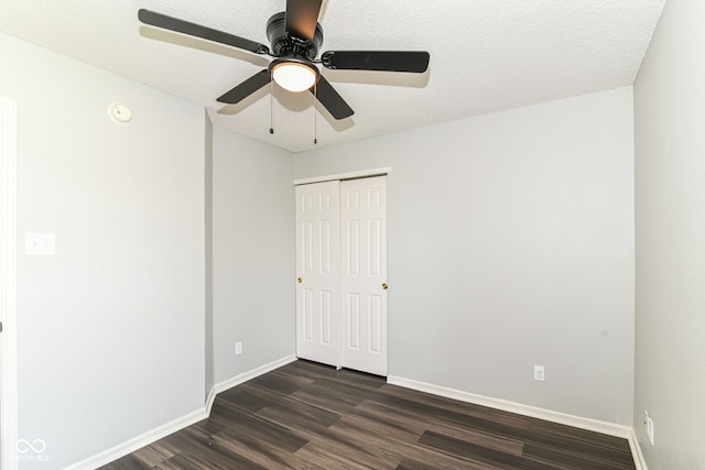 9676 W Constellation Dr, Pendleton, IN 46064 - spare room with dark wood finished floors, ceiling fan, baseboards, and a smoke detector