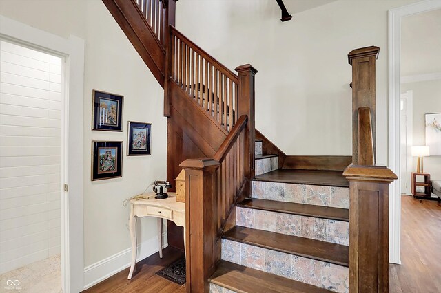 847 N Park Ave, Indianapolis, IN 46202 - staircase featuring wood finished floors and baseboards