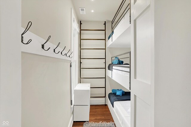 847 N Park Ave, Indianapolis, IN 46202 - walk in closet with dark wood-style flooring