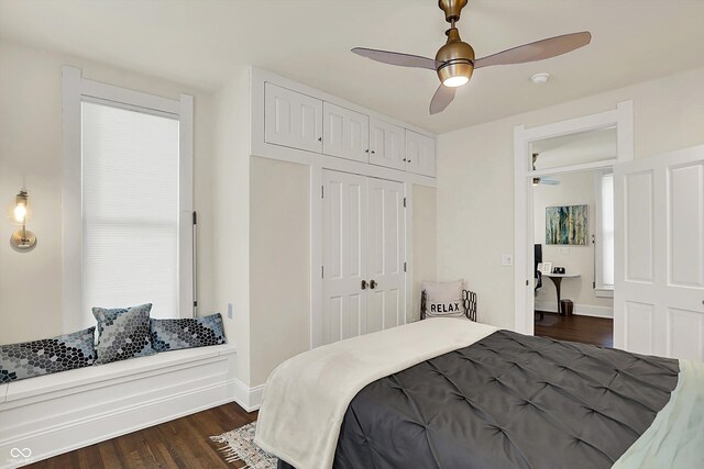 847 N Park Ave, Indianapolis, IN 46202 - bedroom featuring a closet, dark wood-style flooring, a ceiling fan, and baseboards