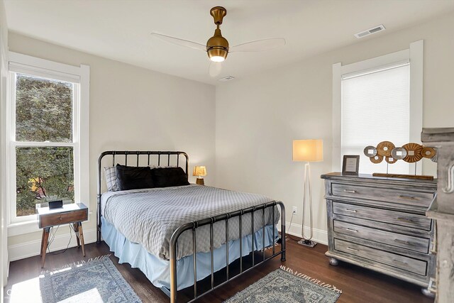 847 N Park Ave, Indianapolis, IN 46202 - bedroom featuring baseboards, wood finished floors, and ceiling fan