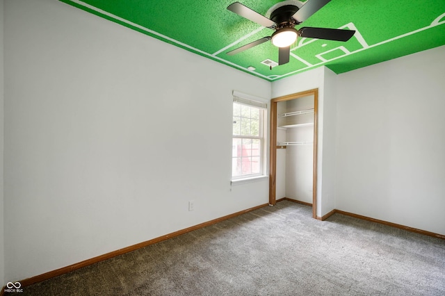 6715 Wandering Way, Indianapolis, IN 46241 - unfurnished bedroom with carpet, baseboards, a closet, and ceiling fan