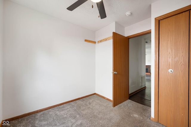 6715 Wandering Way, Indianapolis, IN 46241 - empty room featuring a ceiling fan, carpet floors, baseboards, and a smoke detector